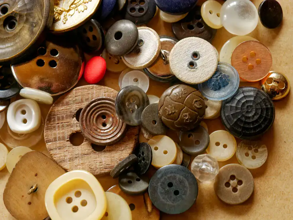 A jar of mixed vintage buttons